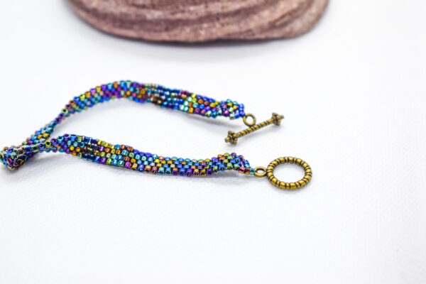 Hand Crafted Flat Metallic Beaded Wear with Bronze Toggle - Image 5
