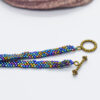 Hand Crafted Flat Metallic Beaded Wear with Bronze Toggle - Image 3