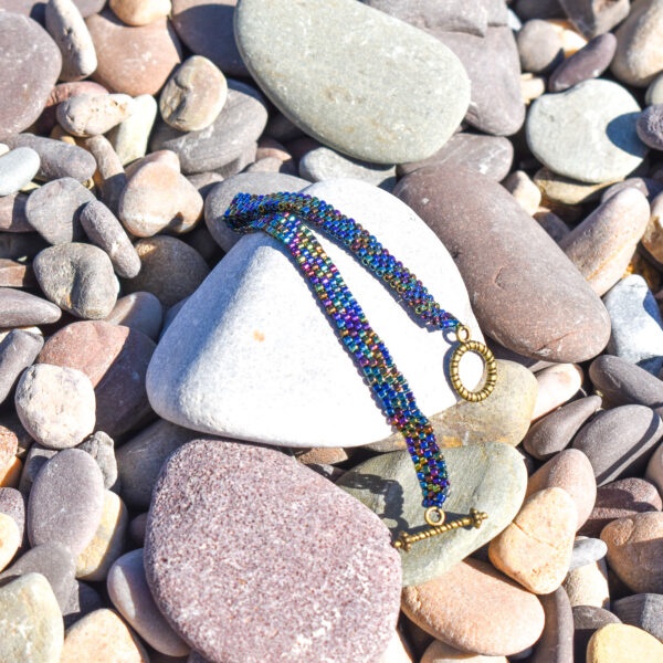 Hand Crafted Flat Metallic Beaded Wear with Bronze Toggle